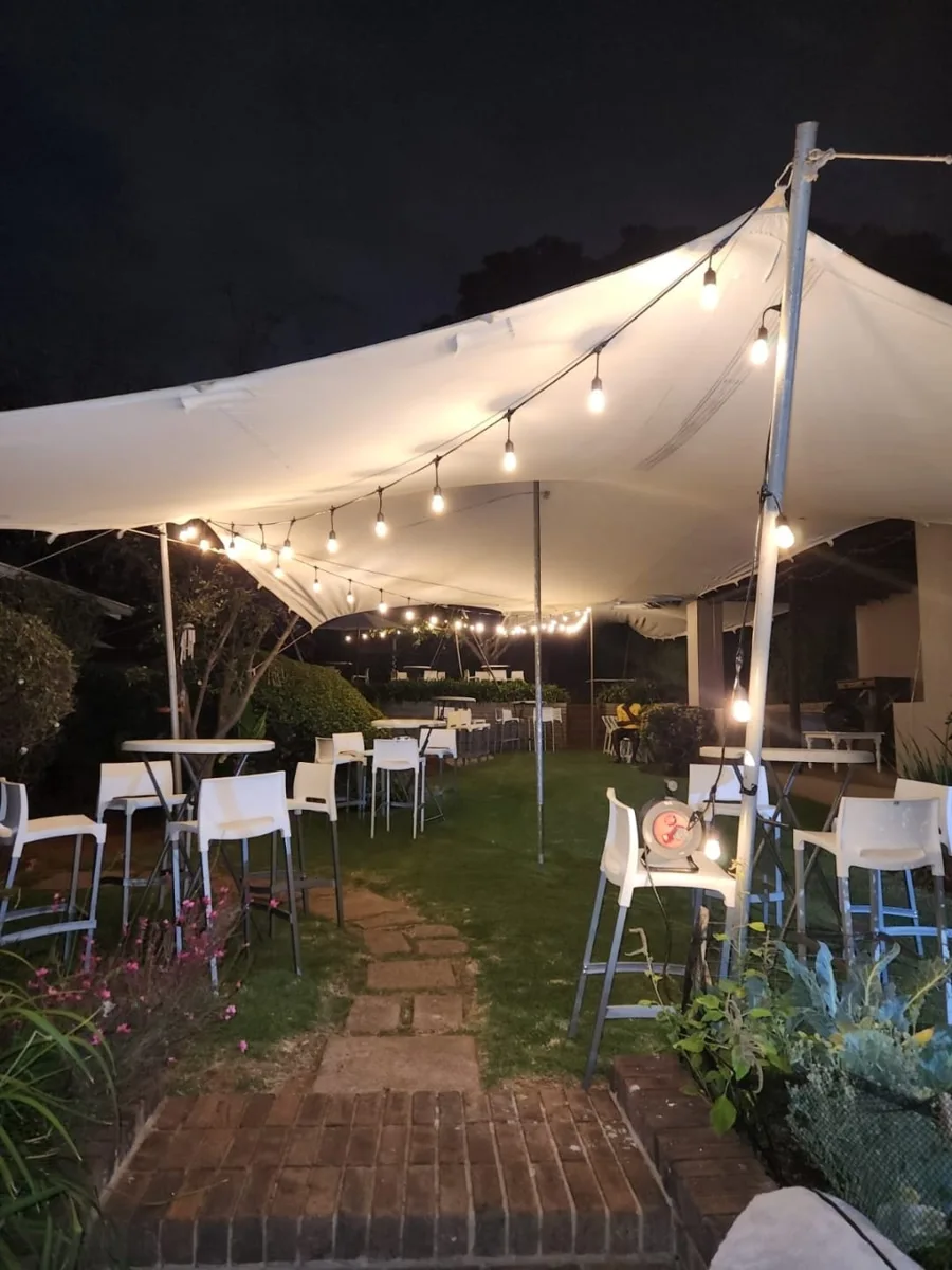 Tent and furniture setup for an outdoor event