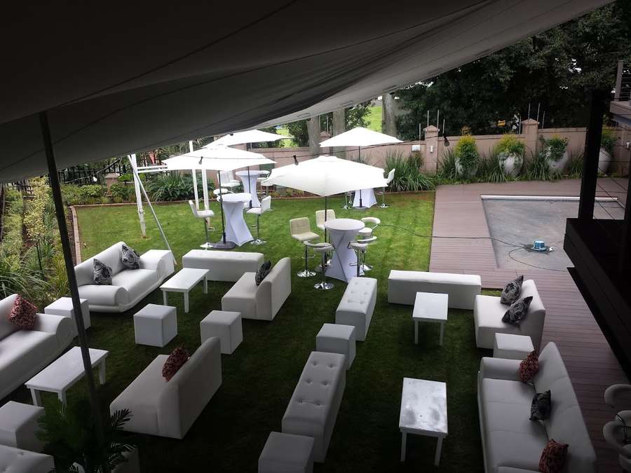 White lounge under stretch tent